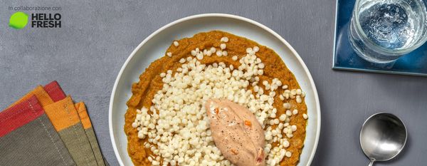 Crema di patate dolci su couscous perlato con crema di stracchino e pomodori secchi 