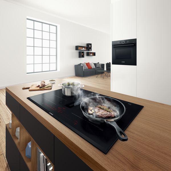 Cooking and baking with modern Bosch home appliances.