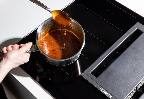 Mixing bbq sauce in pan