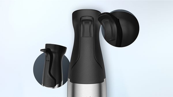 The ergonomic handle of an ErgoMaster hand blender with the SoftTouch grip.