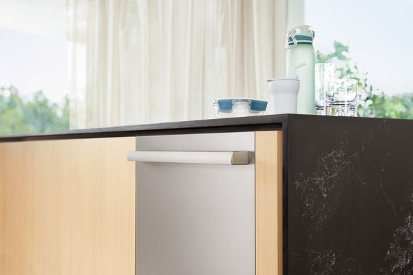 Bosch dishwasher with dishes on counter