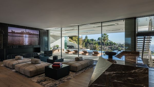Lounge area of luxury Beverly Hills home with views towards Los Angeles 