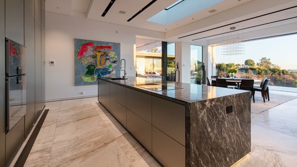Kitchen area of luxury Beverly Hills home with fitted with Gaggenau appliances