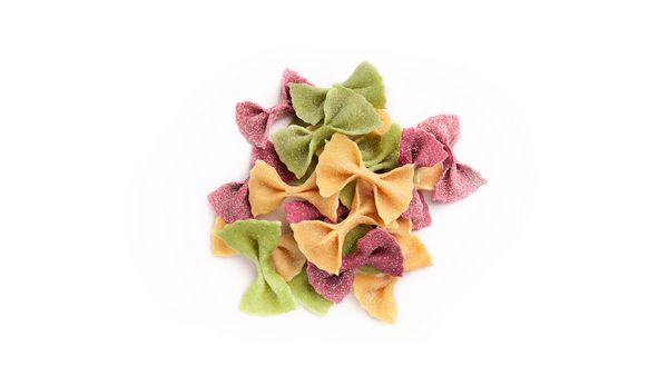 Green, red and green  farfalle pasta shapes.