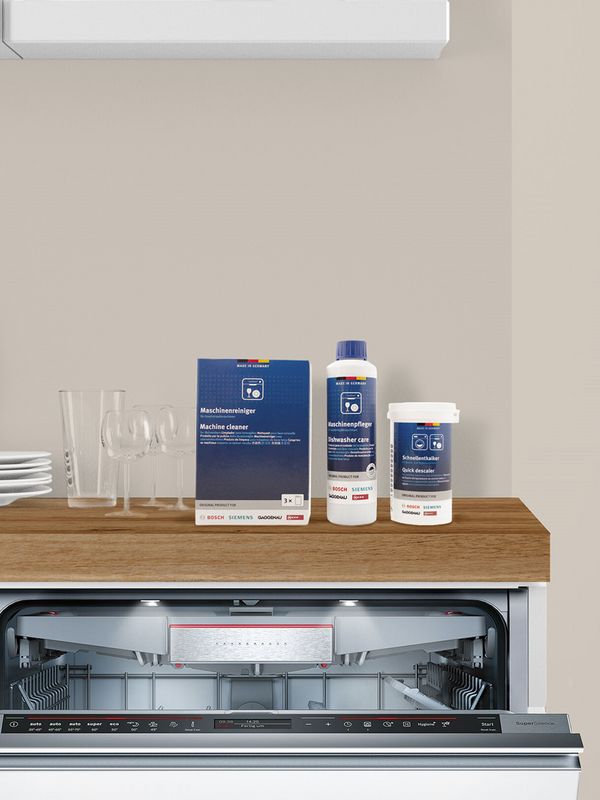 Bosch dishwasher 2023 model teaser showing open dishwasher door with dishes 