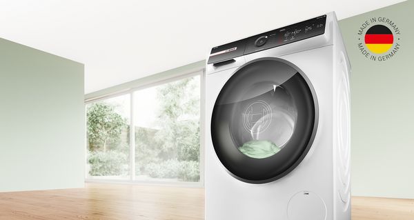 Bosch Waschmaschine in leerstehendem Raum; Made in Germany-Logo