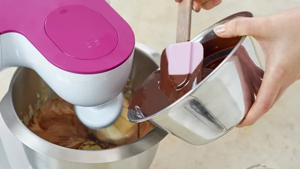 Melted chocolate is added to cake batter.