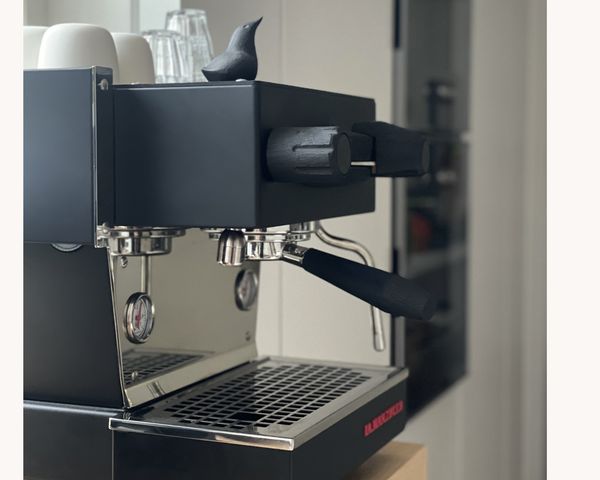 La Marzocco Lines Mini coffee machine with custom blackened oak handles 