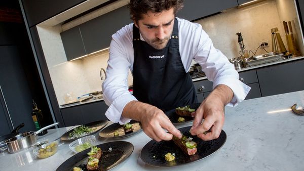 Chef Romu Oudeyer putting the final touches to a beautiful plate of food 