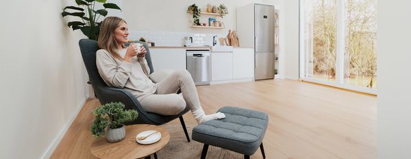 Cuisine avec un bonsaï sur une table symbolisant la protection à vie et l'extension de garantie Bosch.