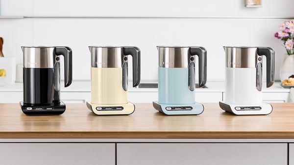 Styline kettles on a kitchen top in black, cream, mint and white.