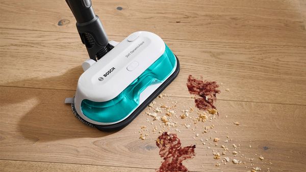 Unlimited 7 Aqua vacuuming and mopping a stain