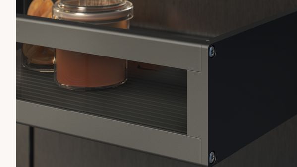View inside the new Gaggenau LUX cooling appliance showing the anthracite aluminium door bins