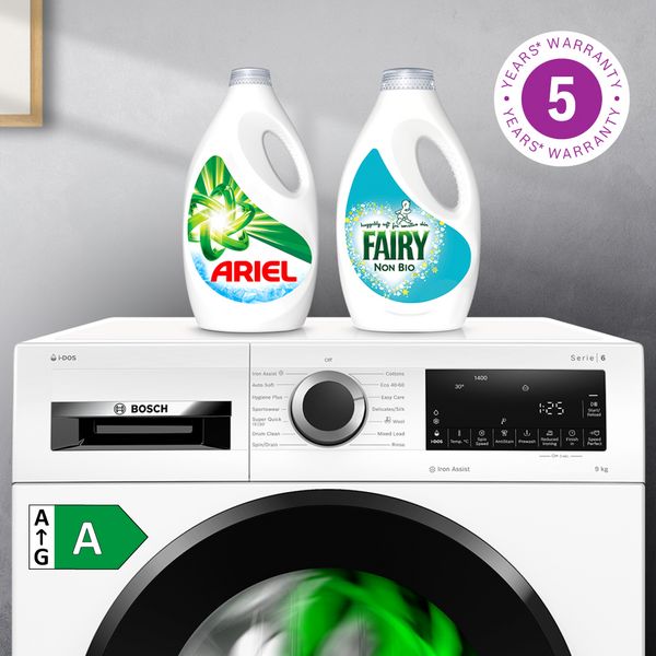 Laundry detergent bottles on top of washing machine