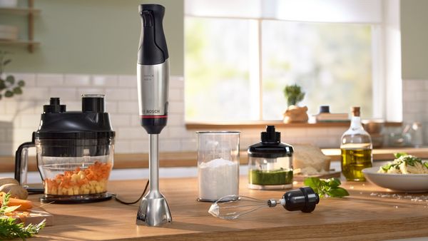 The ErgoMaster hand blender set with the maximum number of attachments on a kitchen worktop.