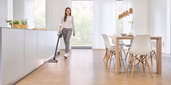 Person using Unlimited vacuum in kitchen space