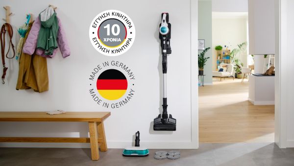 Μια Unlimited 7 ProHygienic Aqua της Bosch ακουμπισμένη σε μια καρέκλα με το άγκιστρο έξυπνης στάθμευσης. Δίπλα της το λογότυπο "Made in Germany" και το λογότυπο "10 Years Guarantee".