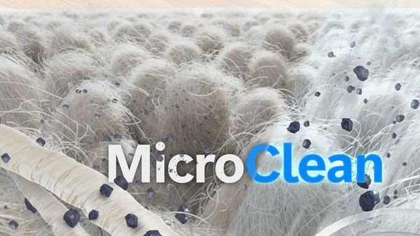 Kilimas, ant kurio yra mikronešvarumų, ir užrašas „MicroClean“.