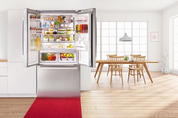 kitchen with an open fridge 