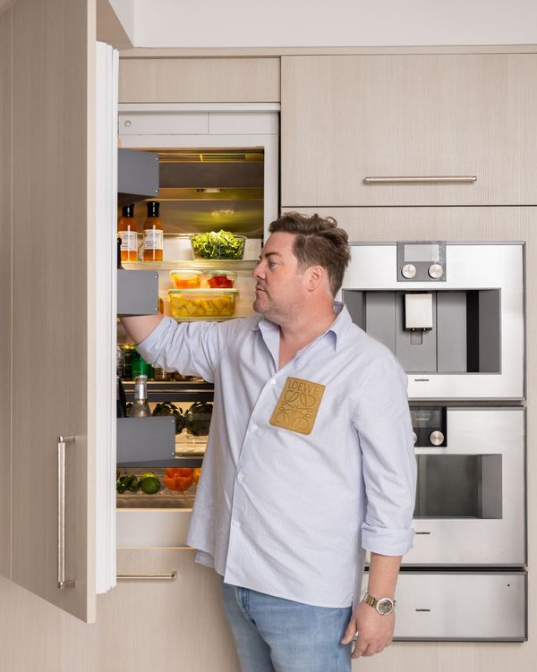 Jonathan Savage opening his Gaggenau fridge