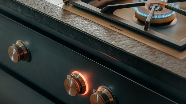 A close-up of the Gaggenau control knobs and Vario 400 series gas hob