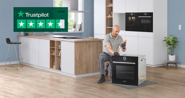 Bosch engineer repairing an oven and trustpilot score showing 'excellent'