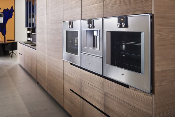 A close-up of Gaggenau 400 series appliances sitting proud of the kitchen furniture