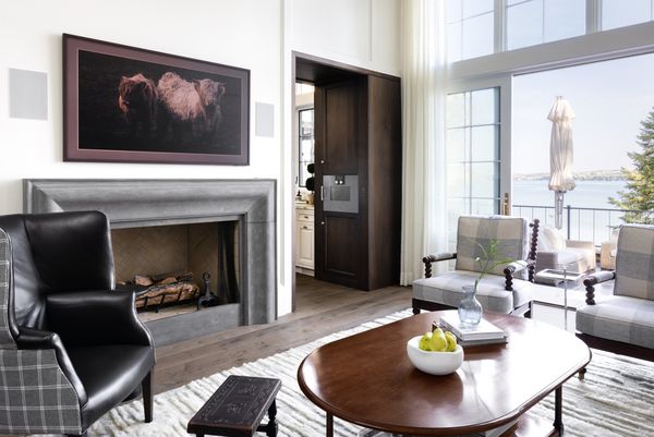 A wide angle photograph of the lounge area, with views across Lake Walloon