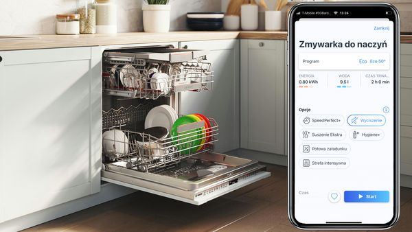 Widok zmywarki z bliska z telefonem po prawej stronie obrazu.