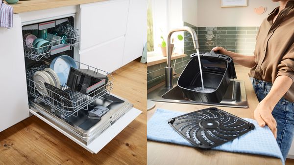 A man loads the empty drawer from his Bosch Air Fryer into the dishwasher in his modern kitchen.