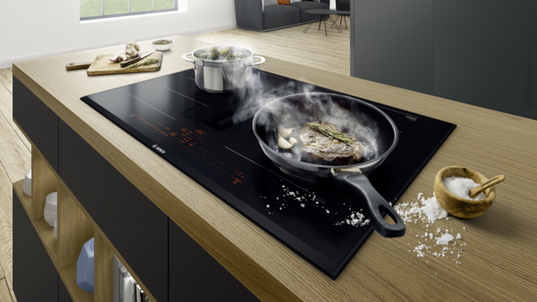 GlassProtect Kochfelder von Bosch accent line – kratzfest, leicht zu reinigen, mit integriertem Dunstabzug und eleganter Glaskeramikoberfläche.