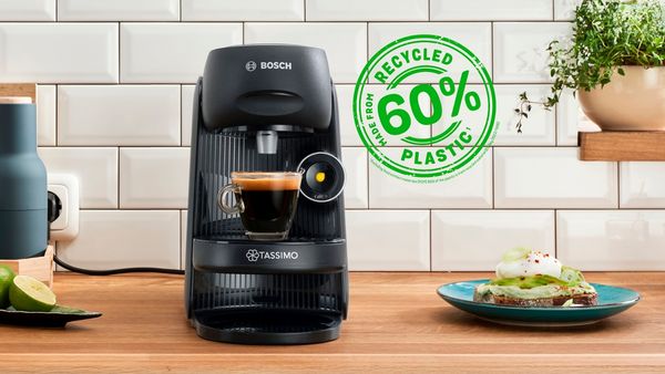 Tassimo machine with drink made and recycled plastic icon