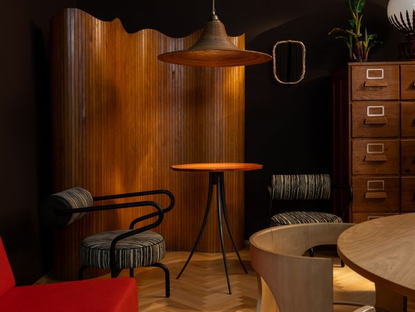 Seating area with subtle lighting in Atelier Karasinski Archive 