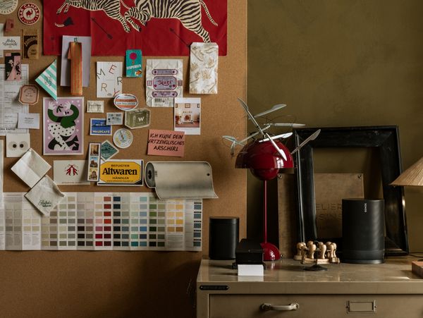Office pin board containing inspiration and colour charts