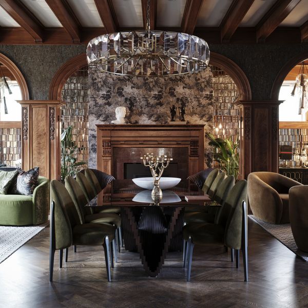 Main entertaining room featuring the main dining table and chandelier.