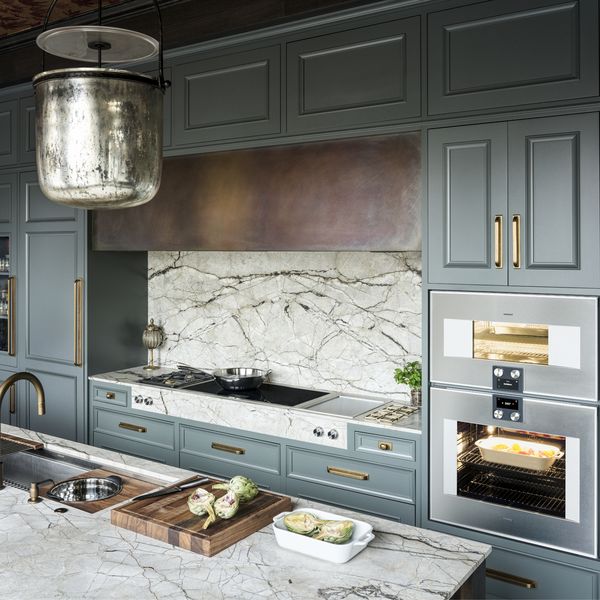 View of main kitchen showing Gaggenau gas cooktop, full surface induction cooktop and Teppan Yaki, combi-steam oven and oven.