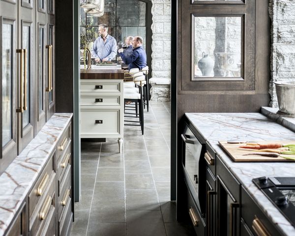 View from the scullery to Matthew Trettel and Ryan Hanson in the main kitchen, showing some of the Vario 200 series downdraft and induction cooktop, the EB 333.