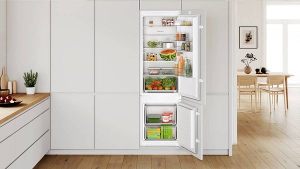 Open Bosch fridge freezer showing 70/30 split