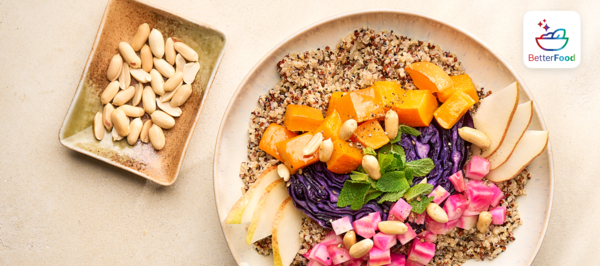 Eine bunte Bowl mit Früchten und Nüssen vor hellem Hintergrund mit dem Bosch BetterFood Logo.