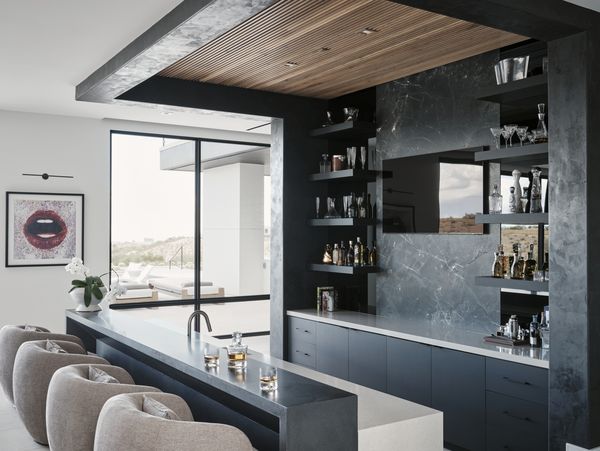 The bar and entertaining area with views of the pool