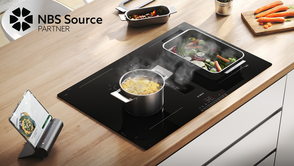 Bosch vented hob with different dishes cooking and NBS Source Partner icon overlay