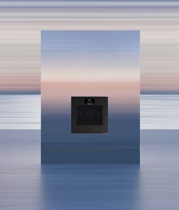 Gaggenau minimalistic oven fitted in a graduated setting resembling a sunset over the sea