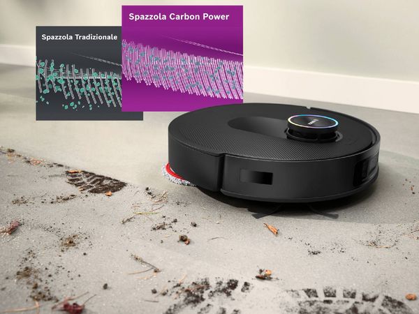 Spotless pulisce sporco e impronte di fango da un pavimento bianco utilizzando la sua Carbon Power Brush.