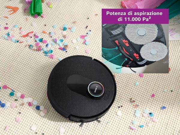 Spotless pulisce sporco e impronte di fango da un pavimento bianco utilizzando la sua Carbon Power Brush.