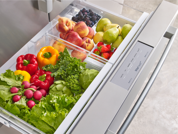 bosch french door refrigerator open with vitafresh drawer open and full of produce