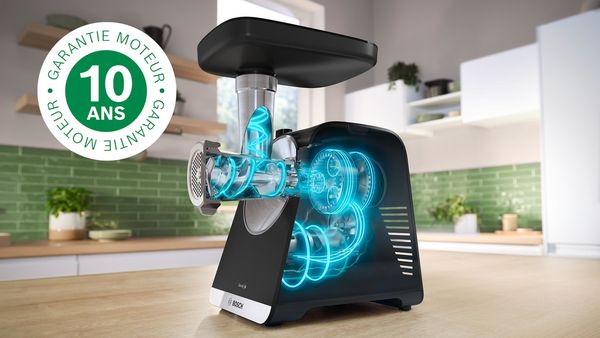 Image aux rayons X du MultiPower série 6 révélant les pièces du moteur à l'intérieur de l'appareil, à côté du logo de garantie 10 ans.