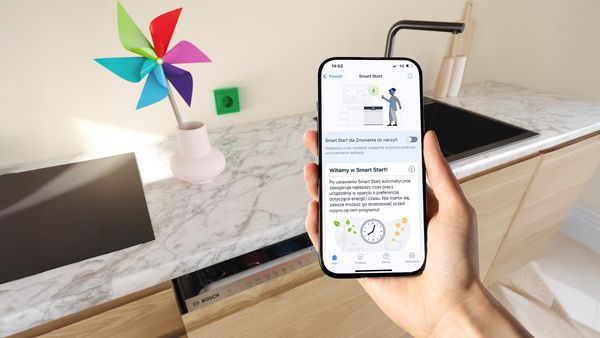 Zmywarka z telefonem i Smart Start na ekranie.