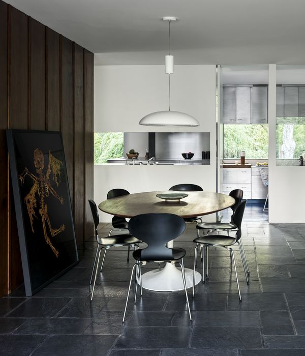 Large open space for dining with kitchen in the background showing clever sight lines within the design