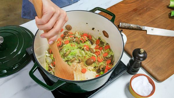 Mixing ingredients together in a large pot