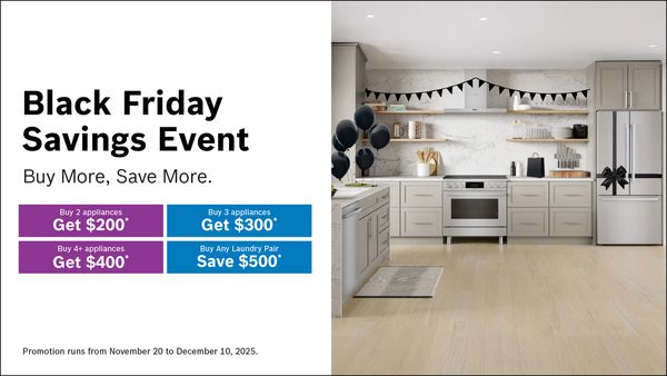 A modern kitchen showcasing a promotion for Black Friday savings with decorative balloons and banners, highlighting discountson appliances.